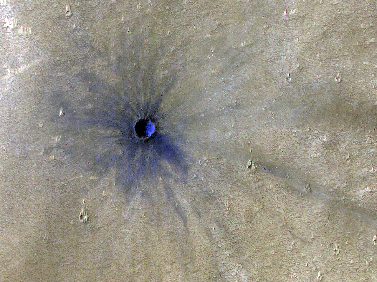 An Impact North of Valles Marineris