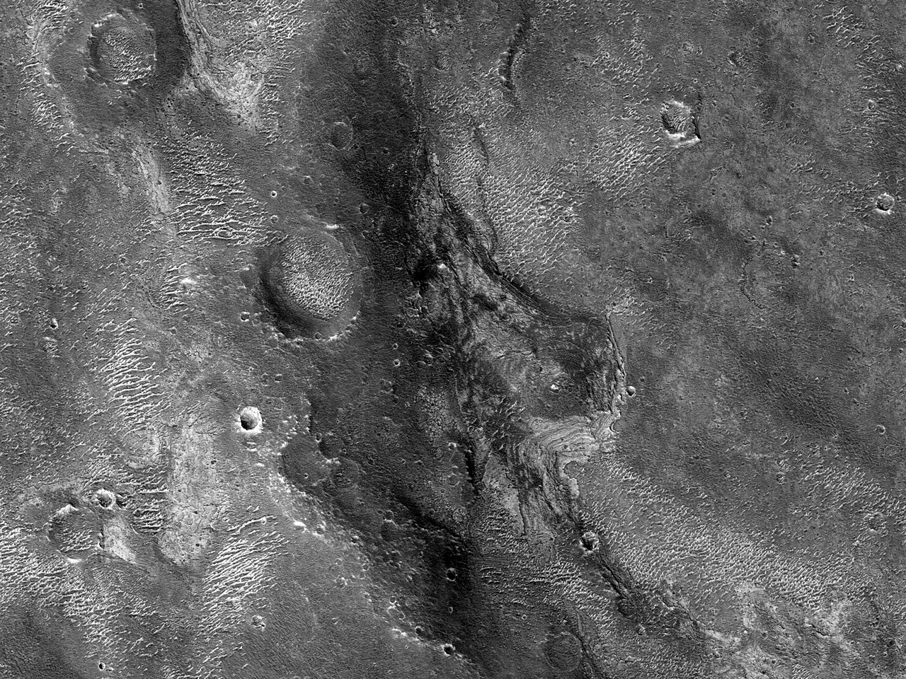 Estrats de tons clars a les planes del sud de labisme Melas (Melas Chasma)
