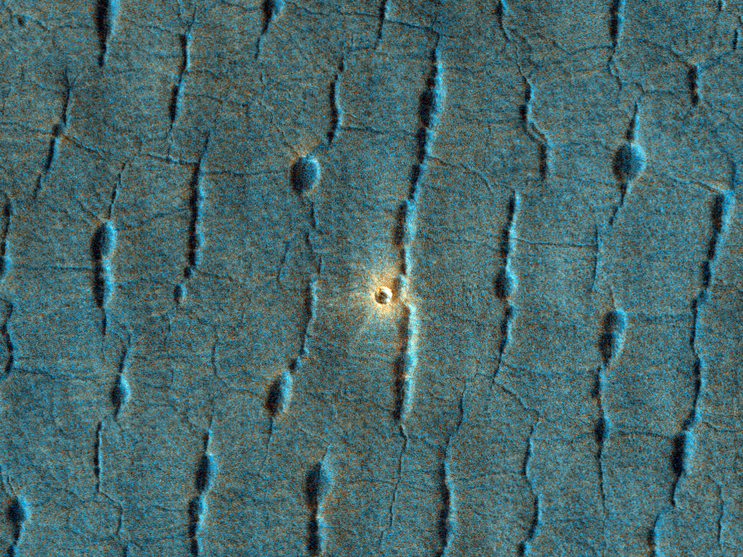 Kis, kör alakú világos tónusú terület az Utopia Planitia síkságon