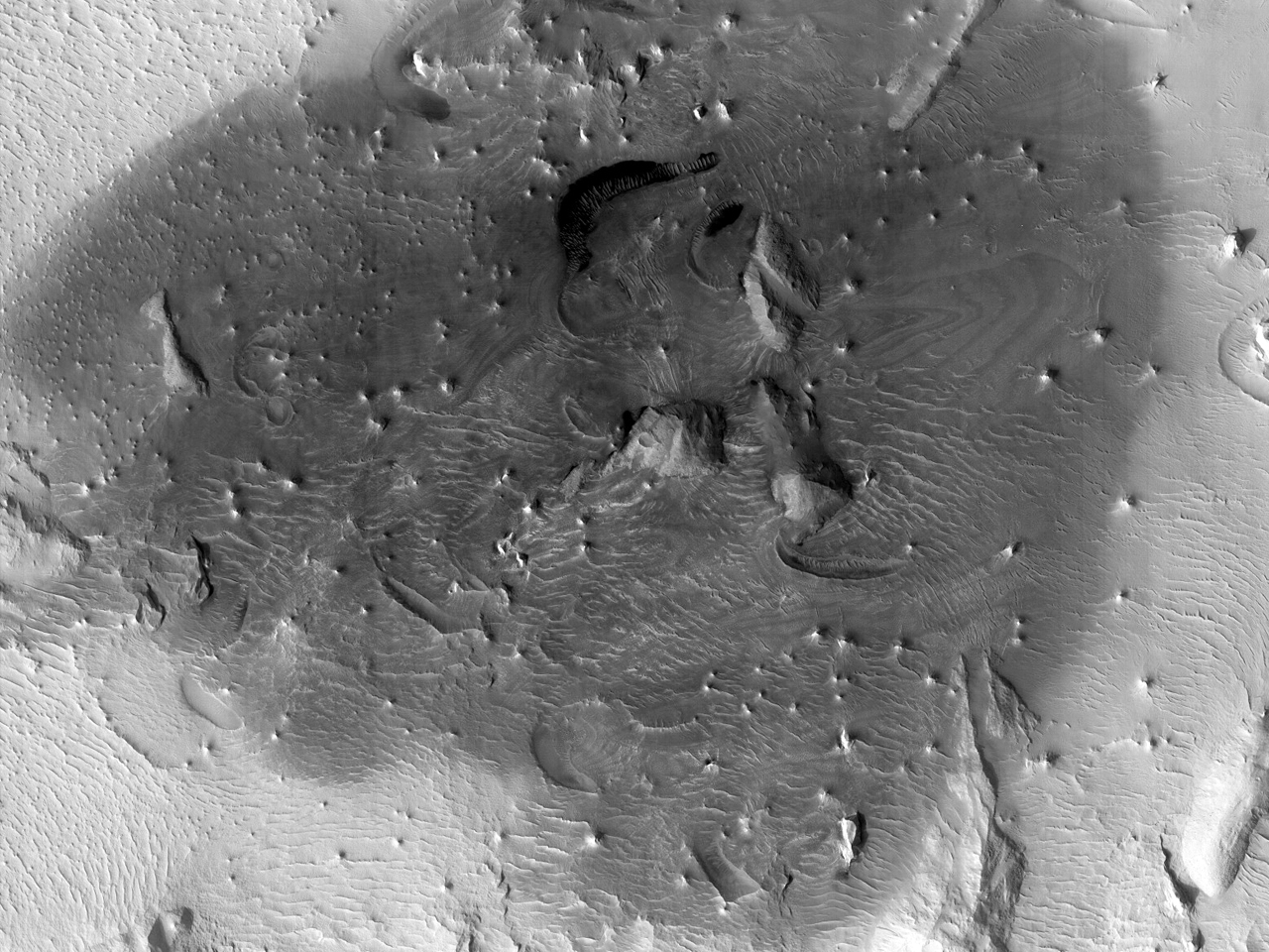 Donker materiaal op Olympus Mons