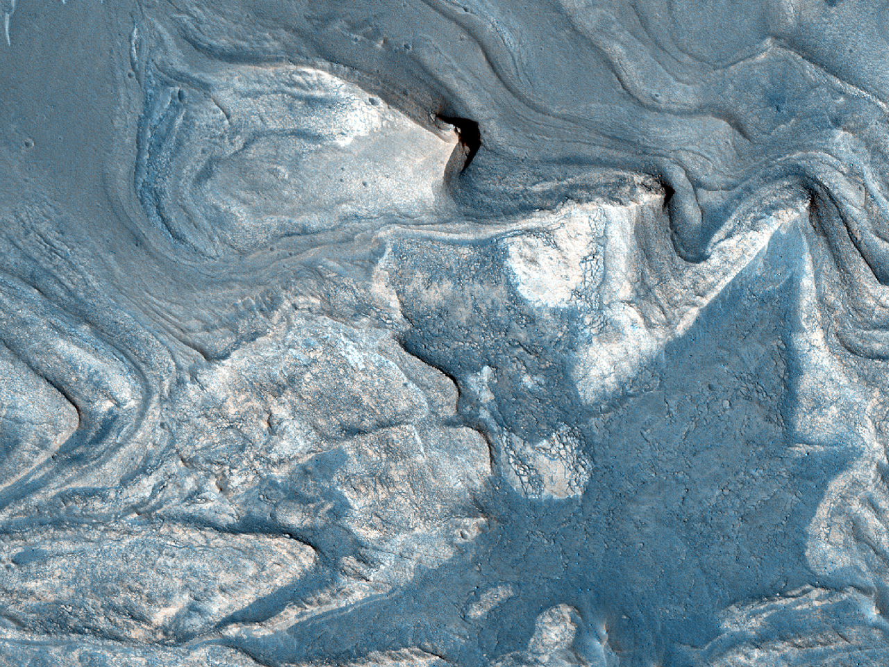 Capes estratificades amb tons suaus a lest de Melas Chasma