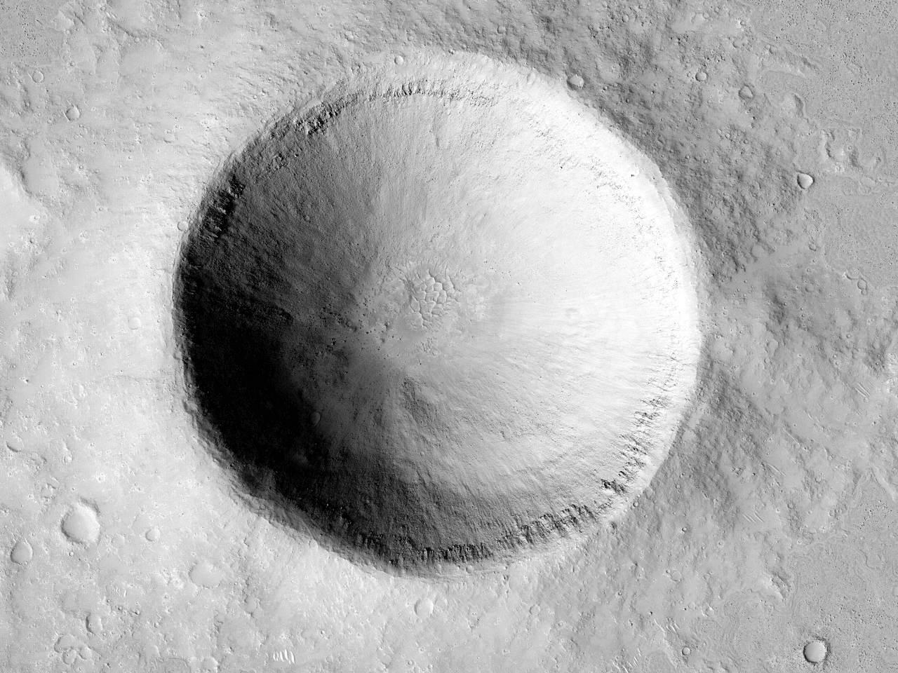 1-2 kilométeres átmérőjű kráterek az Elysium Planitia nyugati részén