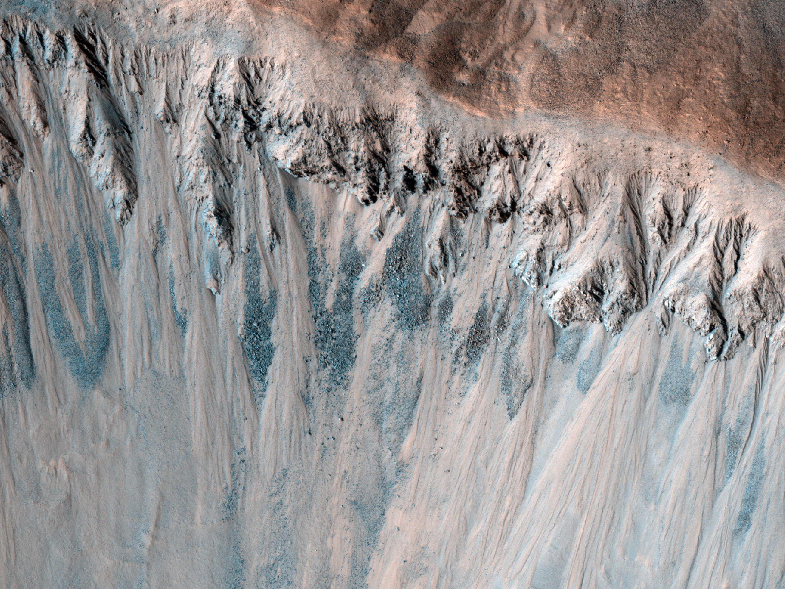 Cratere ricco di gole nel tropico marziano
