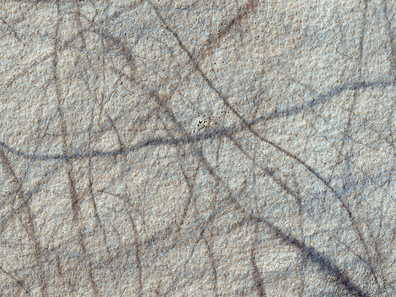 Sporen van een stofhoos in Sisyphi Planum
