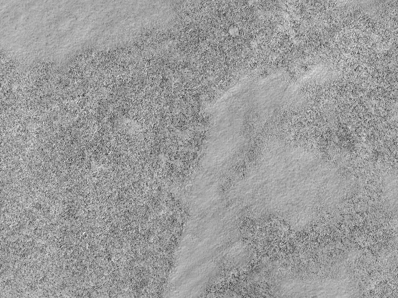 Скелясте відслонення на південний схід від рівнини Hellas Planitia