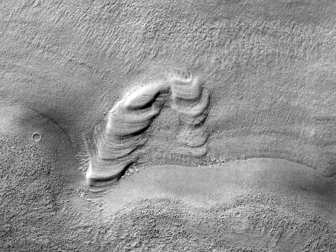 Geschichtete Strukturen in Hellas Planitia
