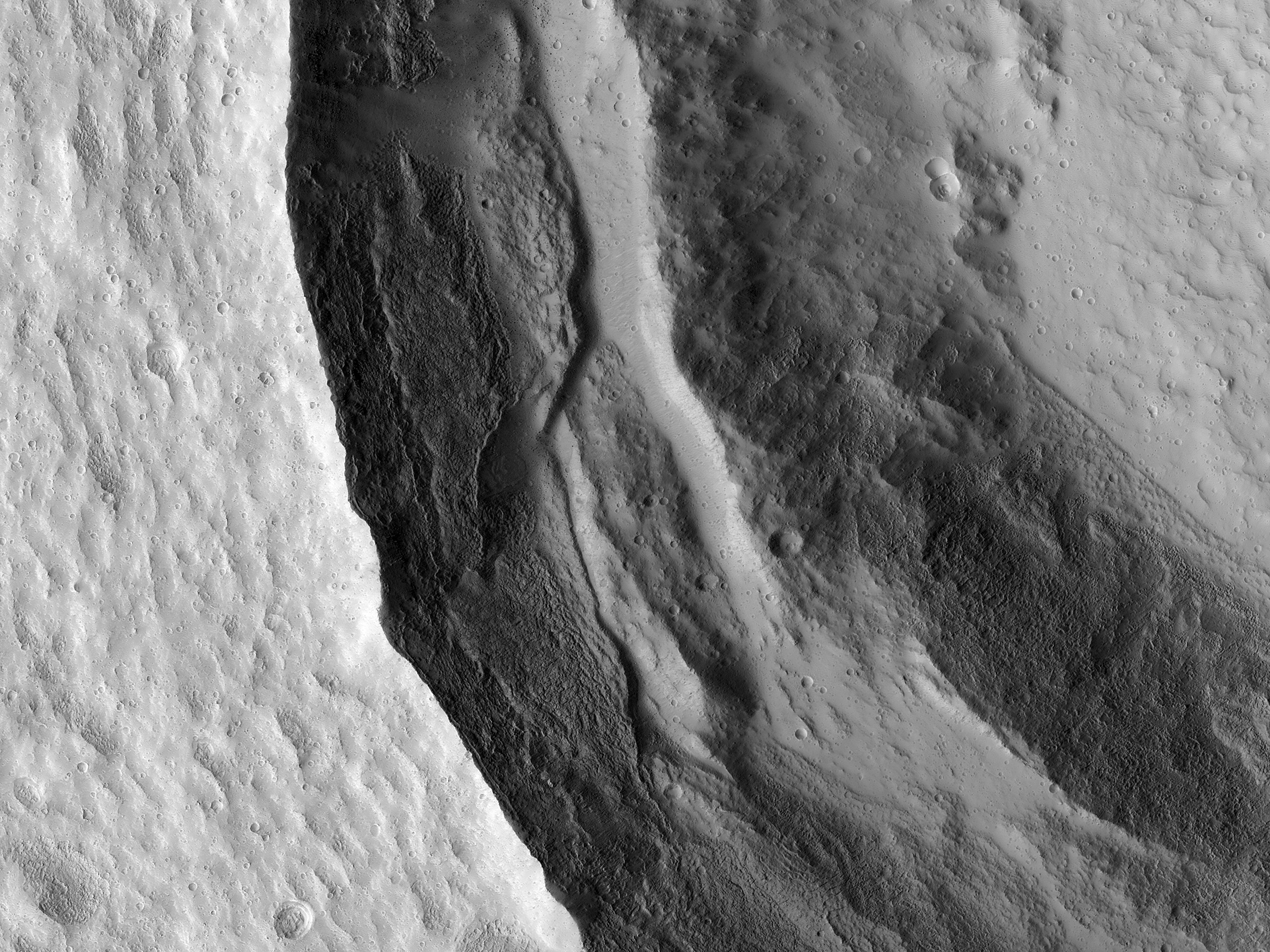 Slumping Terraces on a Crater Wall 