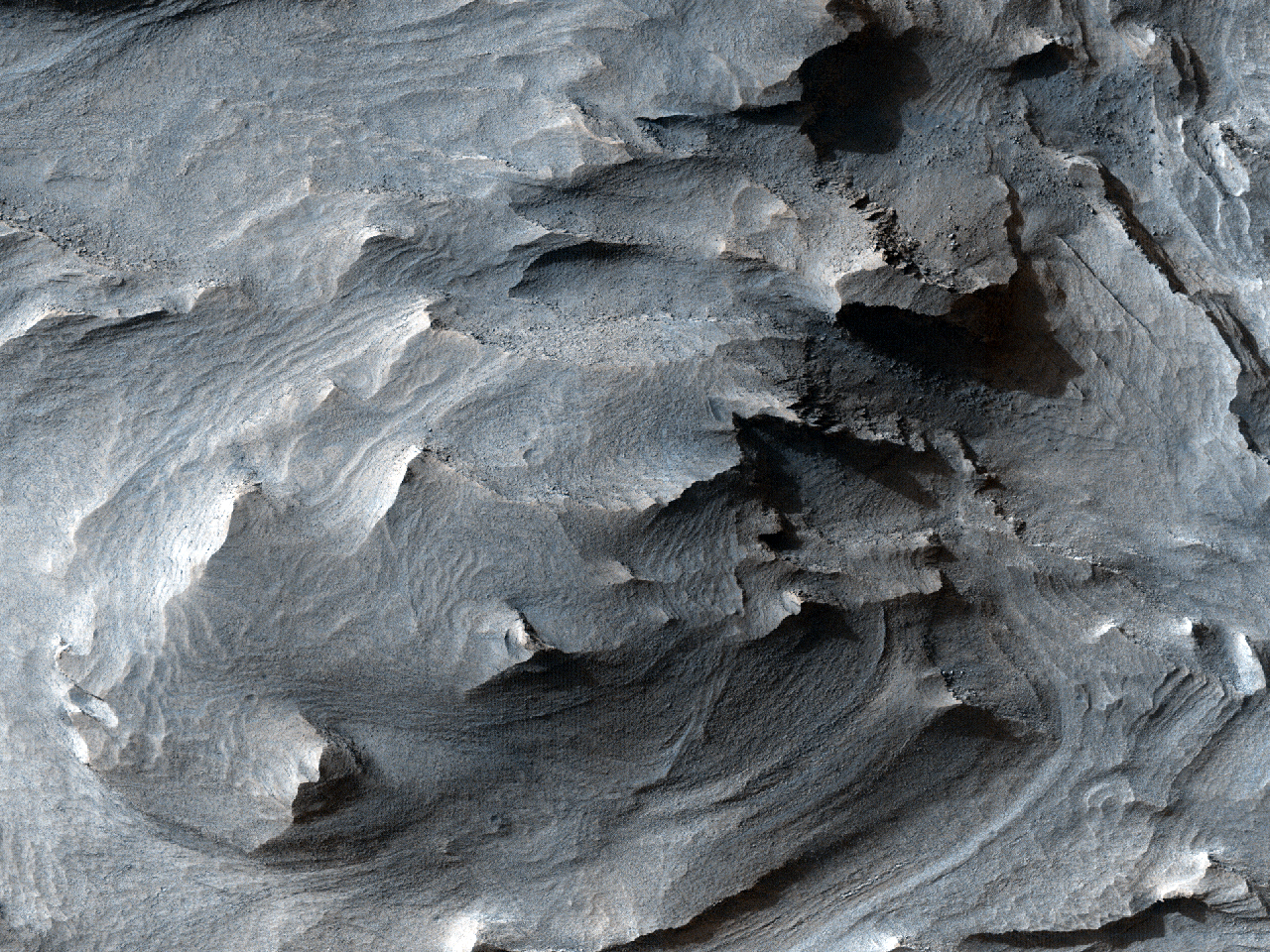 西"Candor Chasma"区域地表的层状堆积岩石