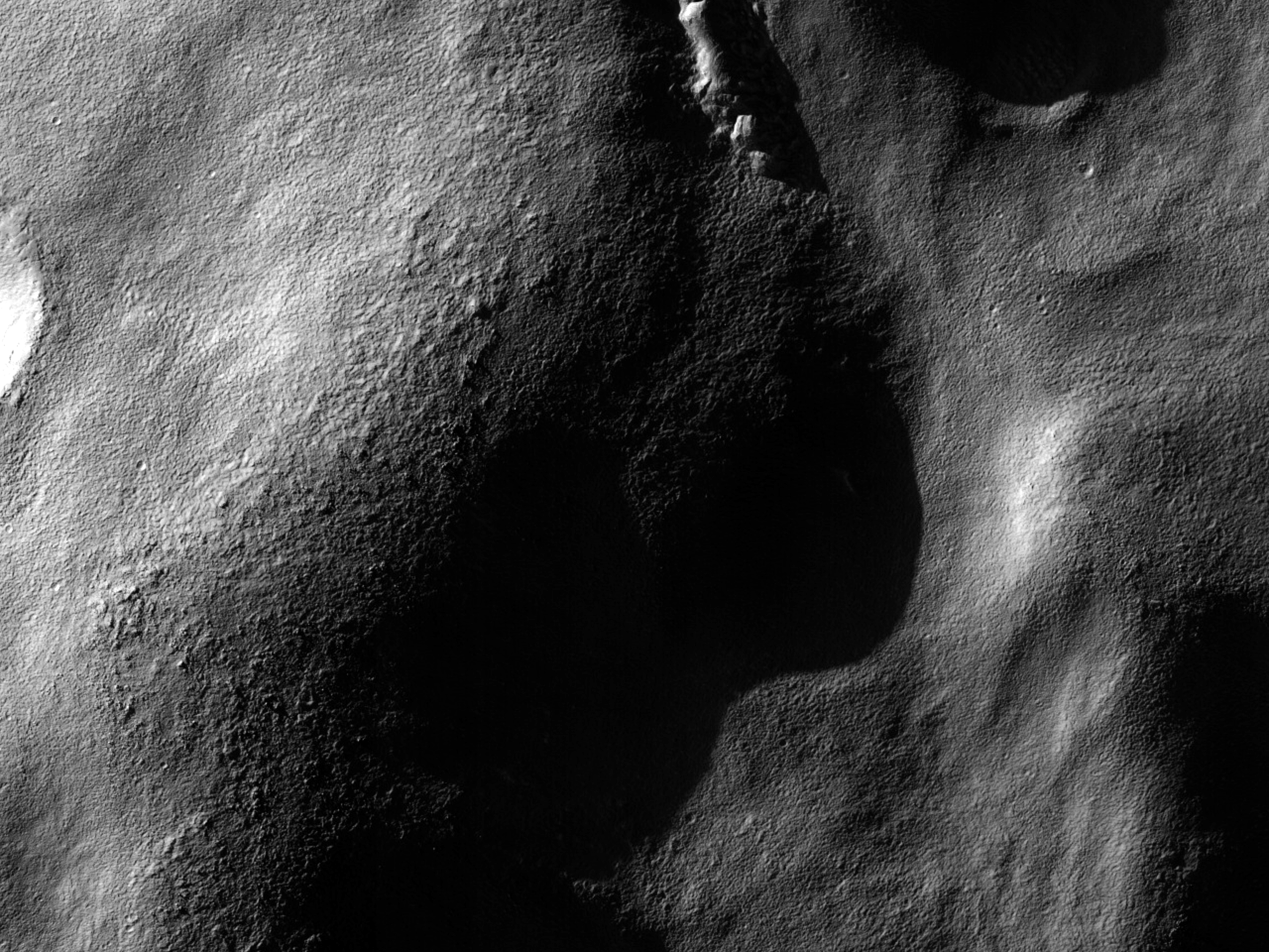 Stark verformter Krater in Promethei Terra