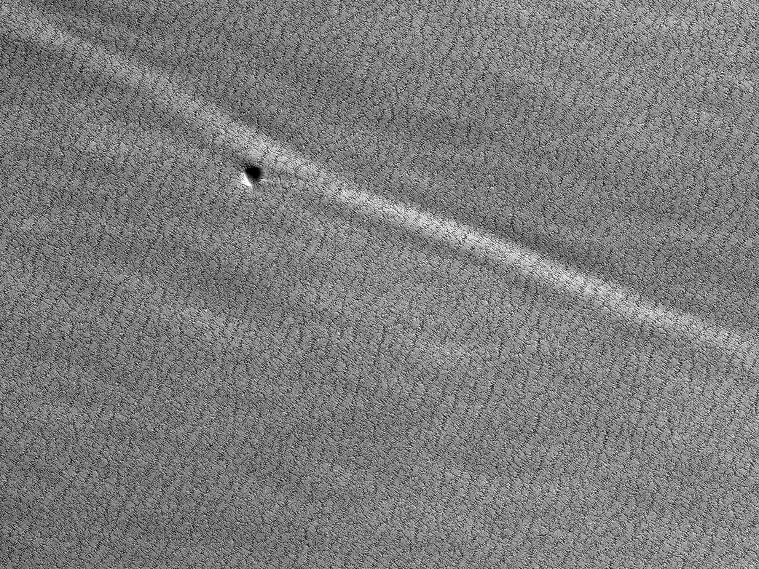A Mysterious Bright Streak on the South Polar Layered Deposits