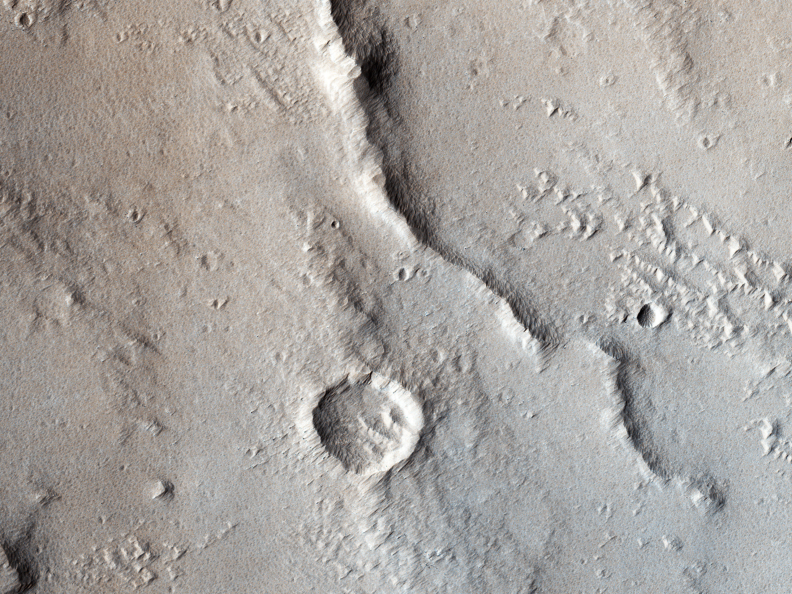 Wrinkle Ridges and Pit Craters