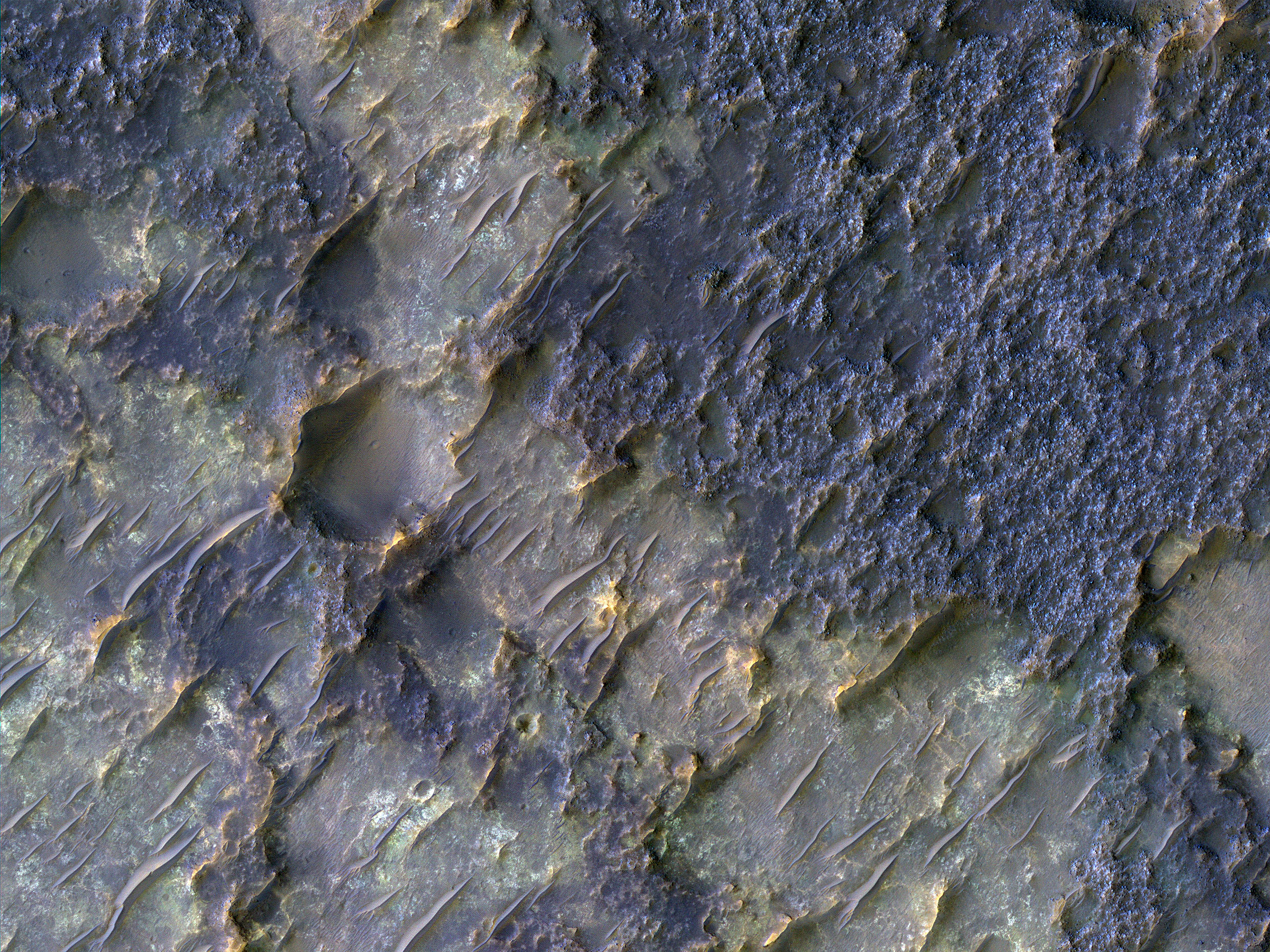 Contact between Two Distinct Types of Bedrock Northwest of Hellas Planitia