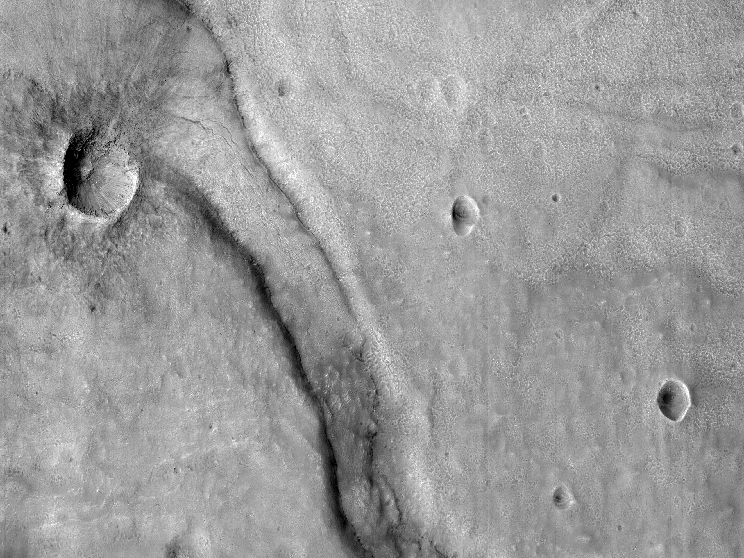 Smooth and Fractured Deposits in Eridania Valleys