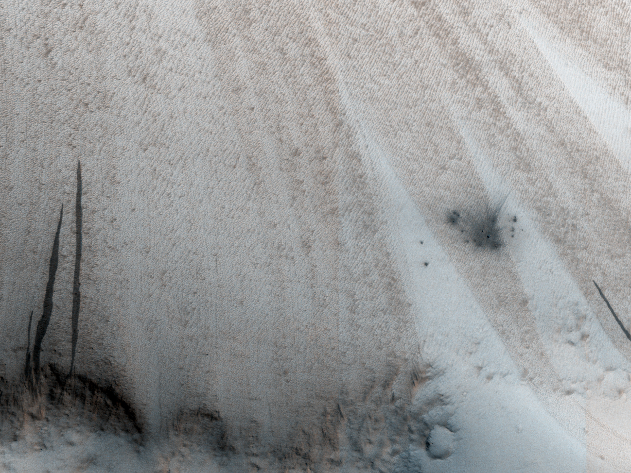 A New Crater on a Dusty Slope