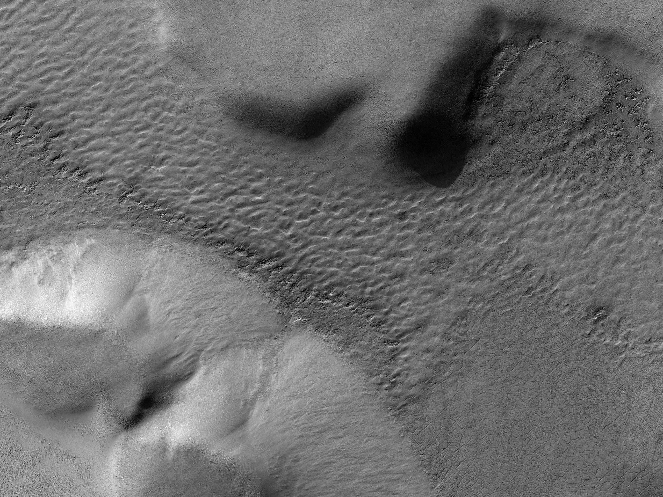 Depression Adjacent to Crater in South Polar Region