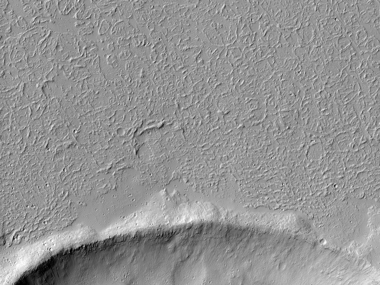 מכתש מוקף בזרימות באזור ממערב לאקוס קזמה (Echus Chasma)