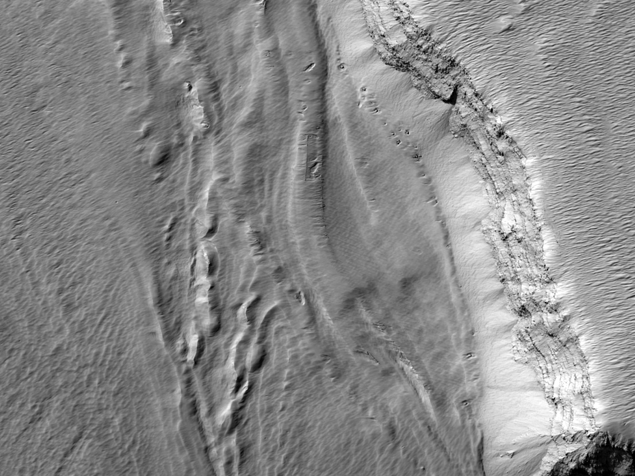 Ytterkanten av en isbre-lignende strm p Arsia Mons