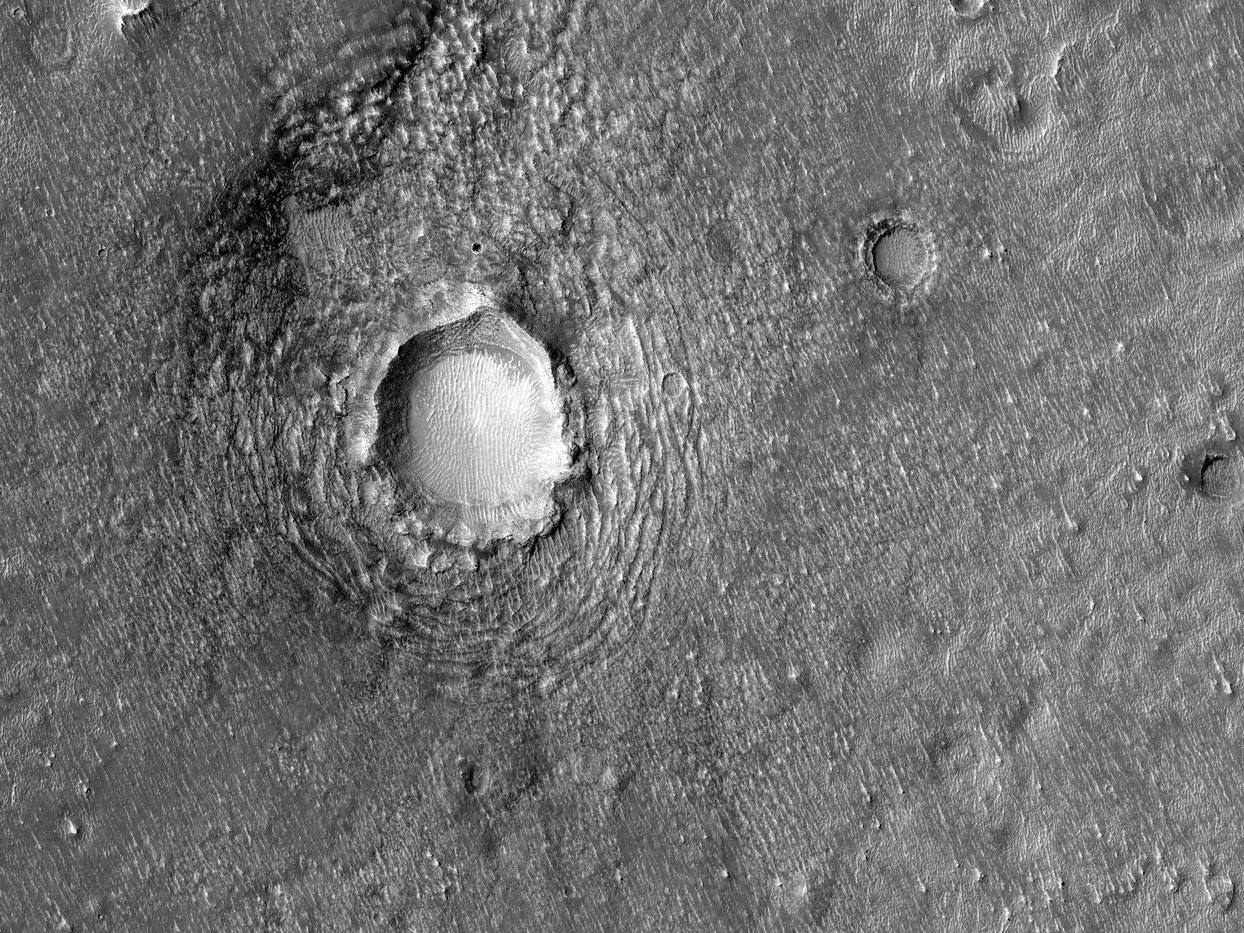 Ein Krater und eine Strmung in der Nhe von Galaxias Fluctus