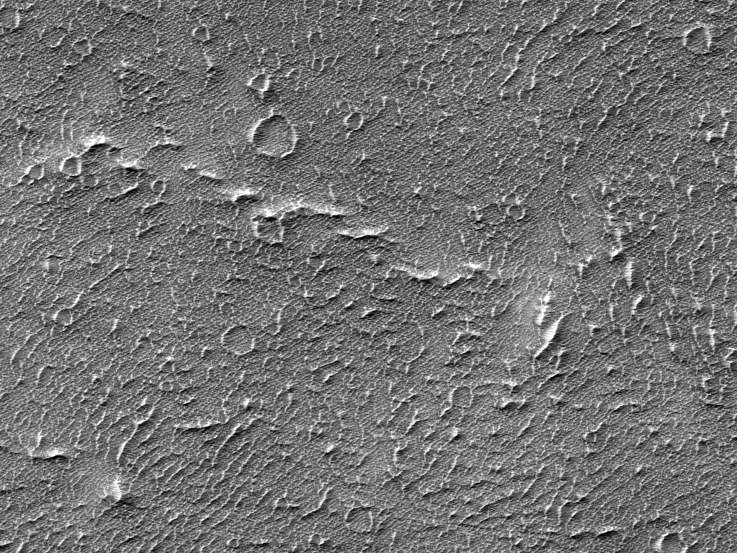 Fält med mycket gammal lavaström väster om Arsia Mons