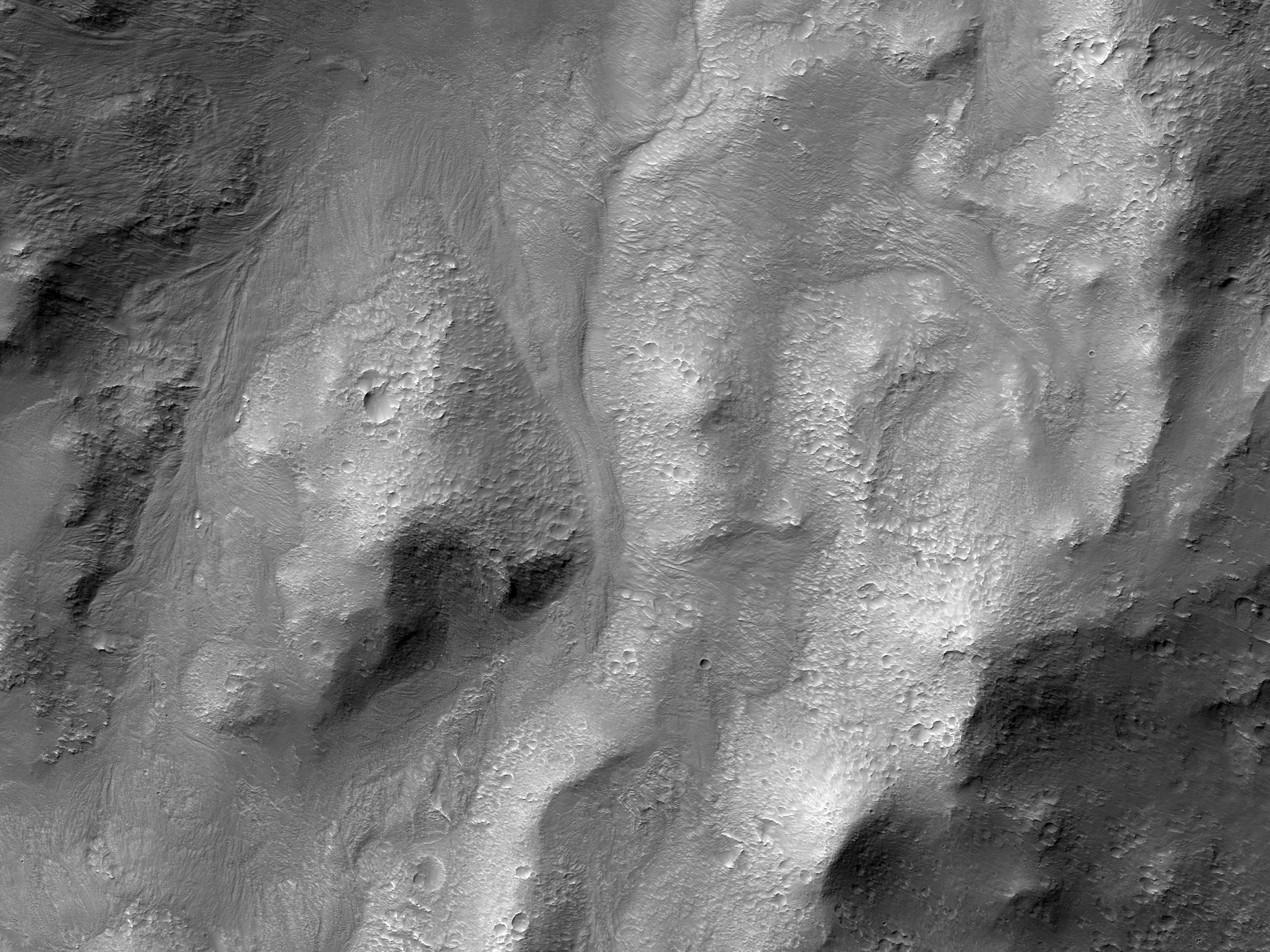 Másodlagos becsapódások és folyási képződmények a Noord kráterben a Noachis Terrán