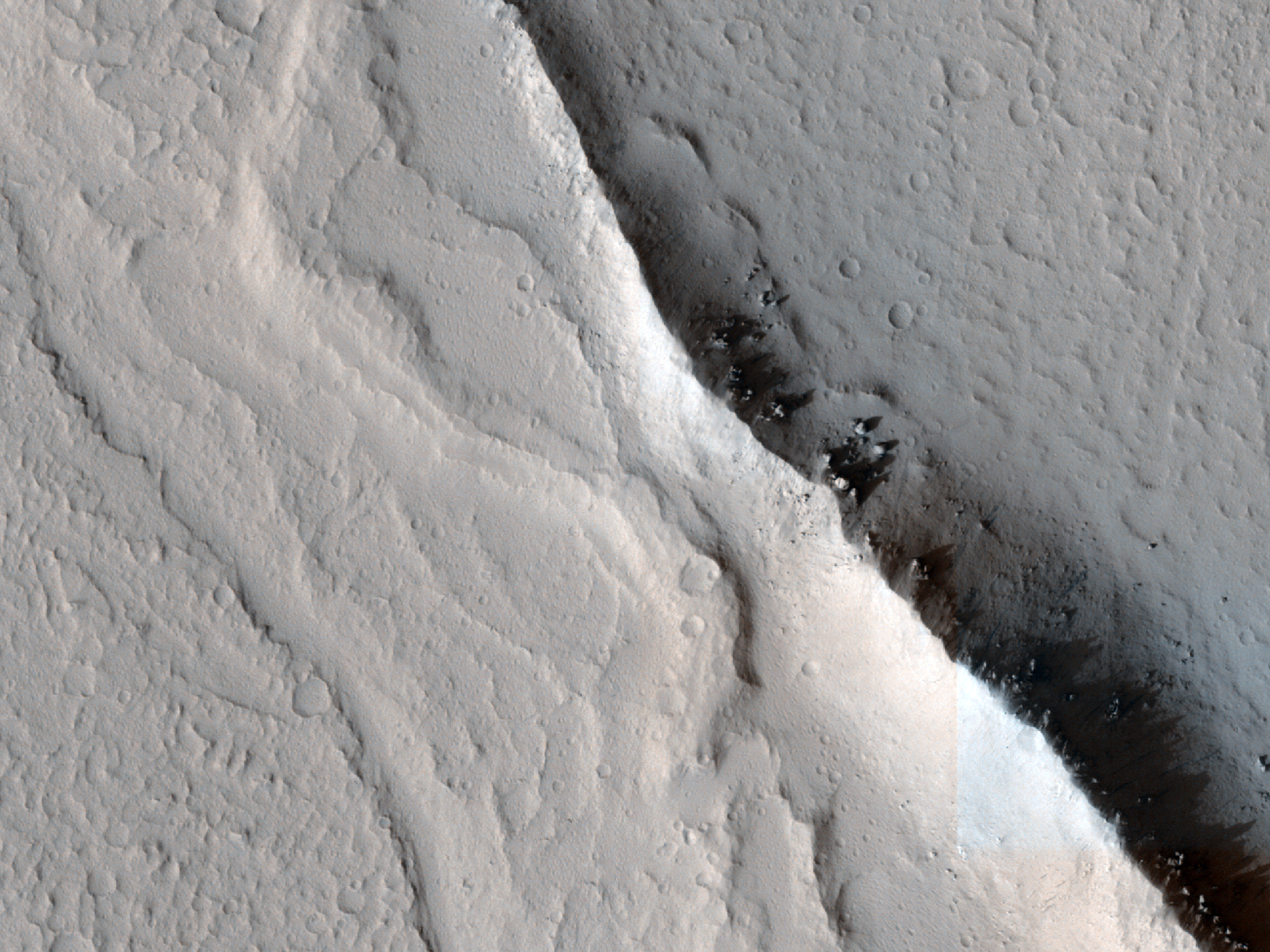 Ridge Standing above Lava Surface on Floor of Echus Chasma