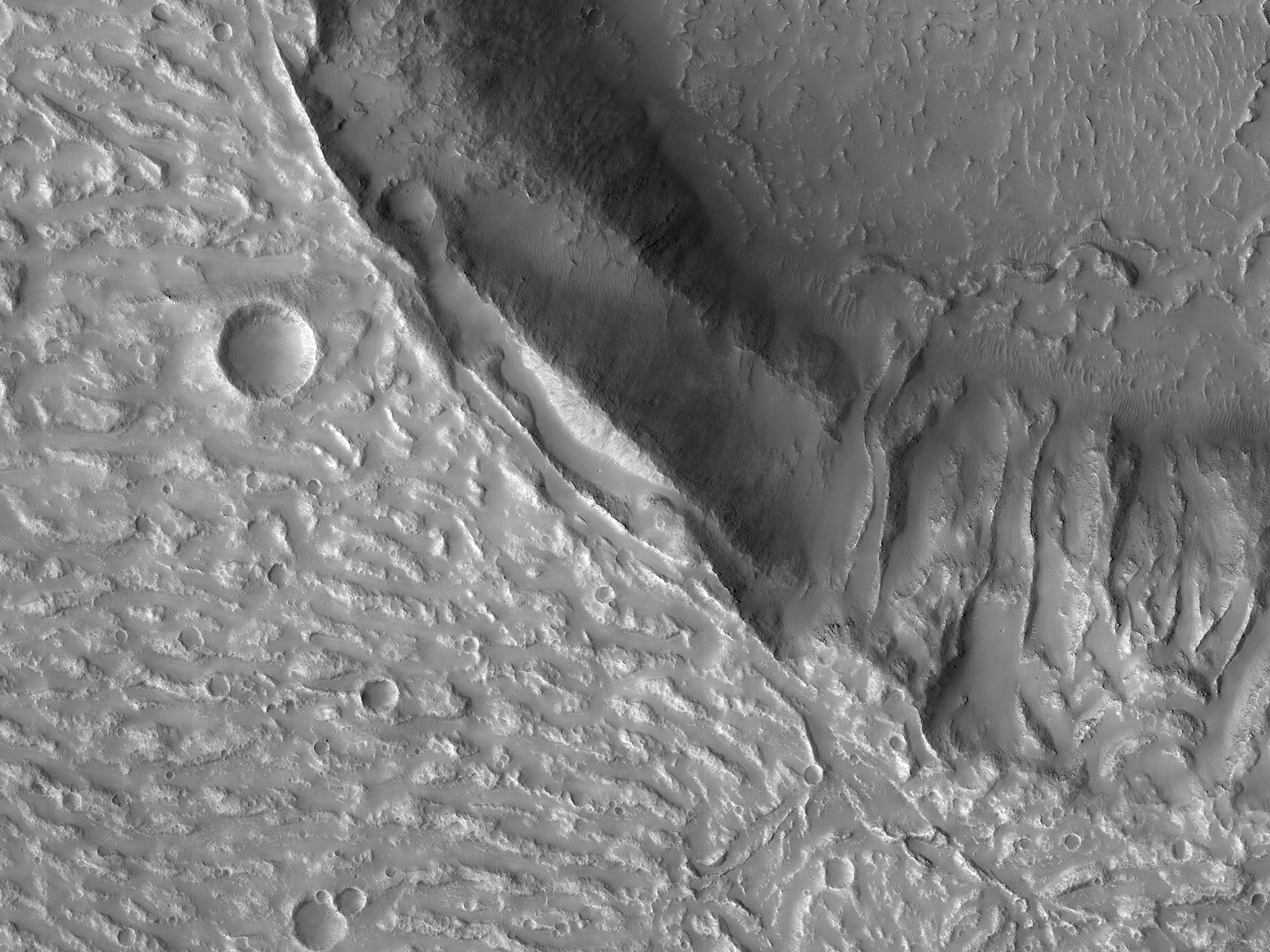 Western Flank of Crater Overtopped by Flows