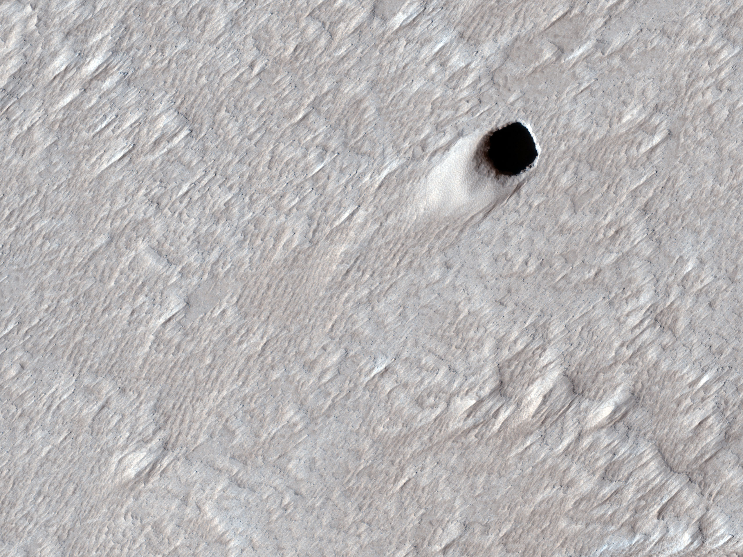 Pit Craters and Giant Volcanoes