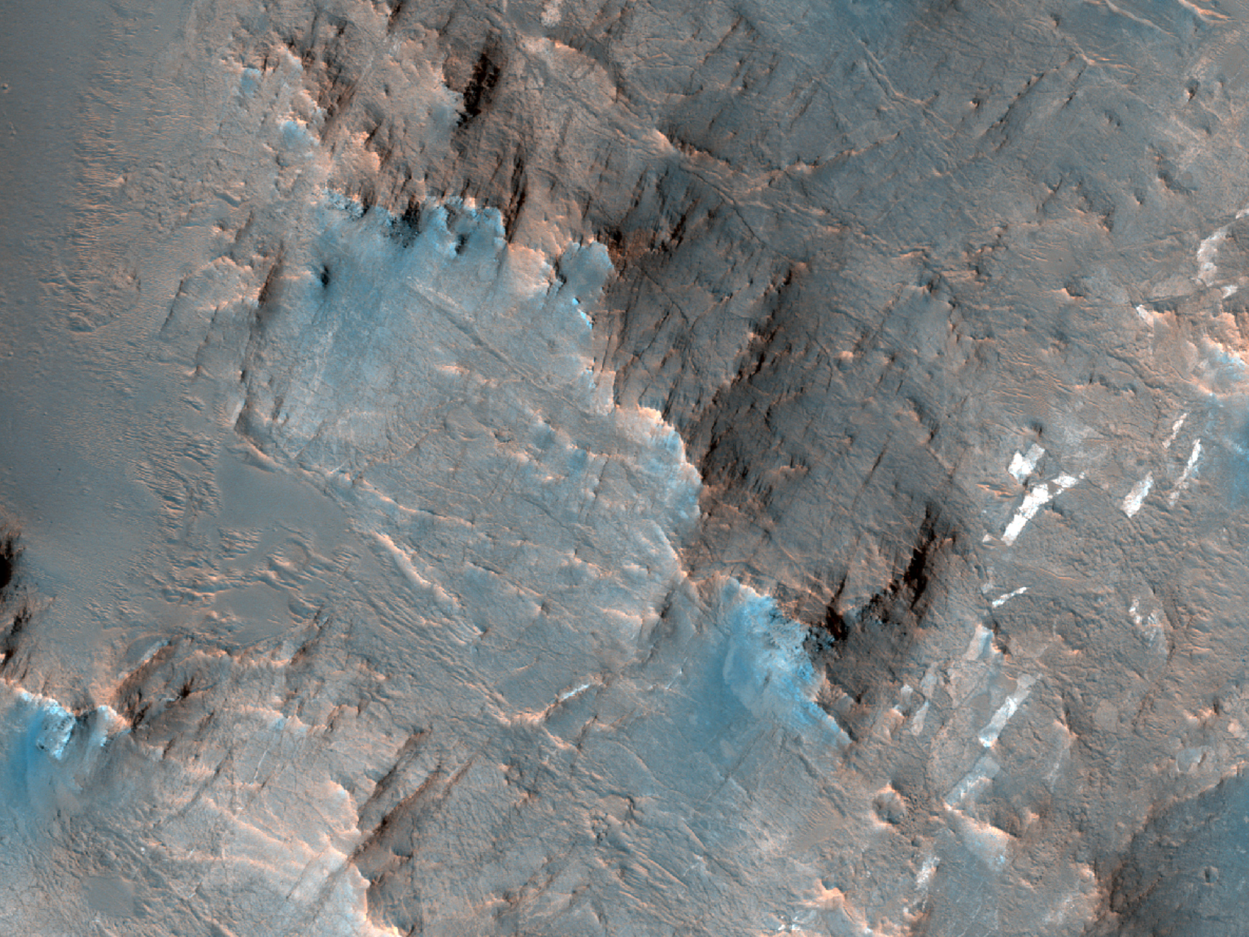 A Clay-Rich Central Pit and Landslide in Tyrrhena Terra