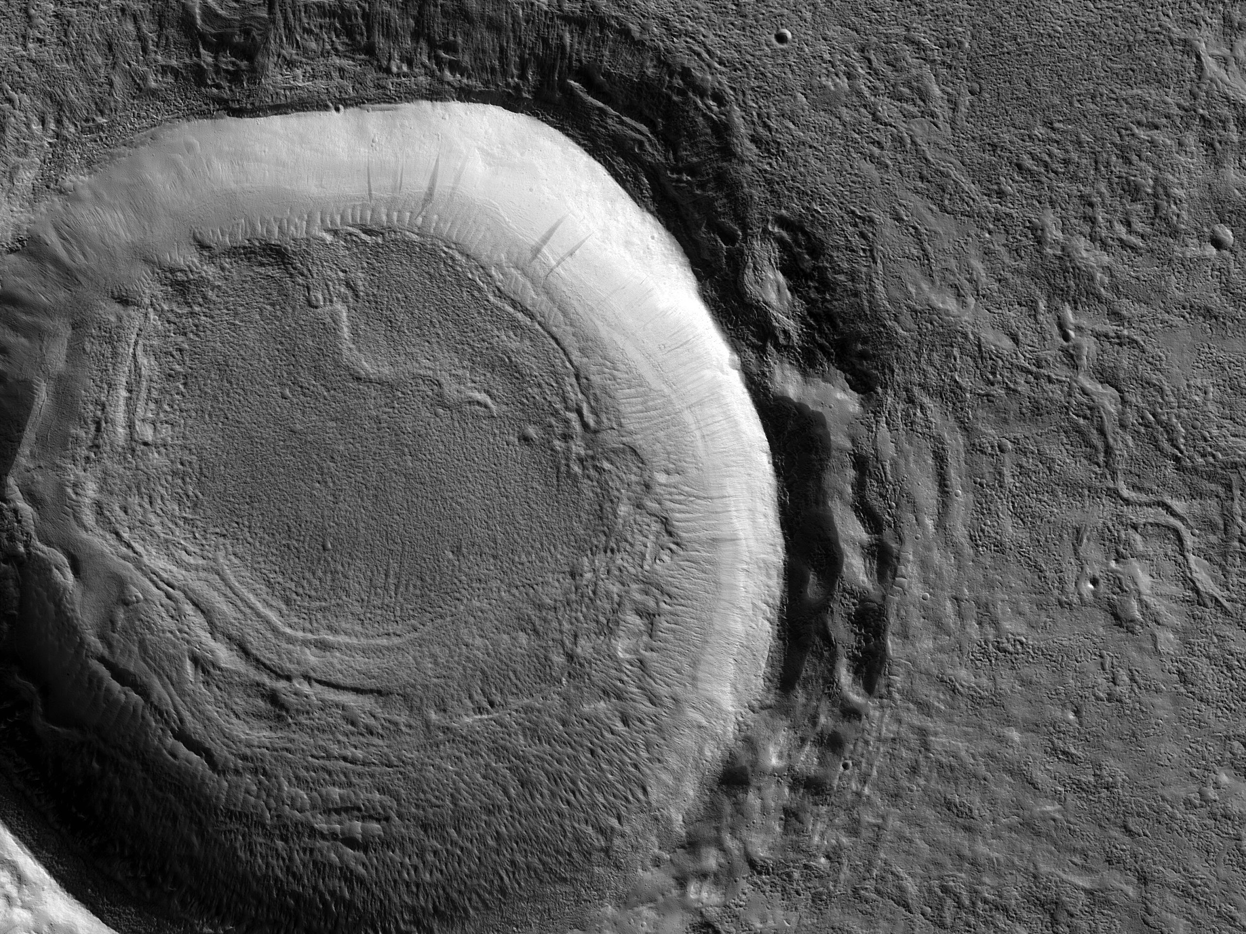 A Layered Crater Deposit in Tempe Fossae