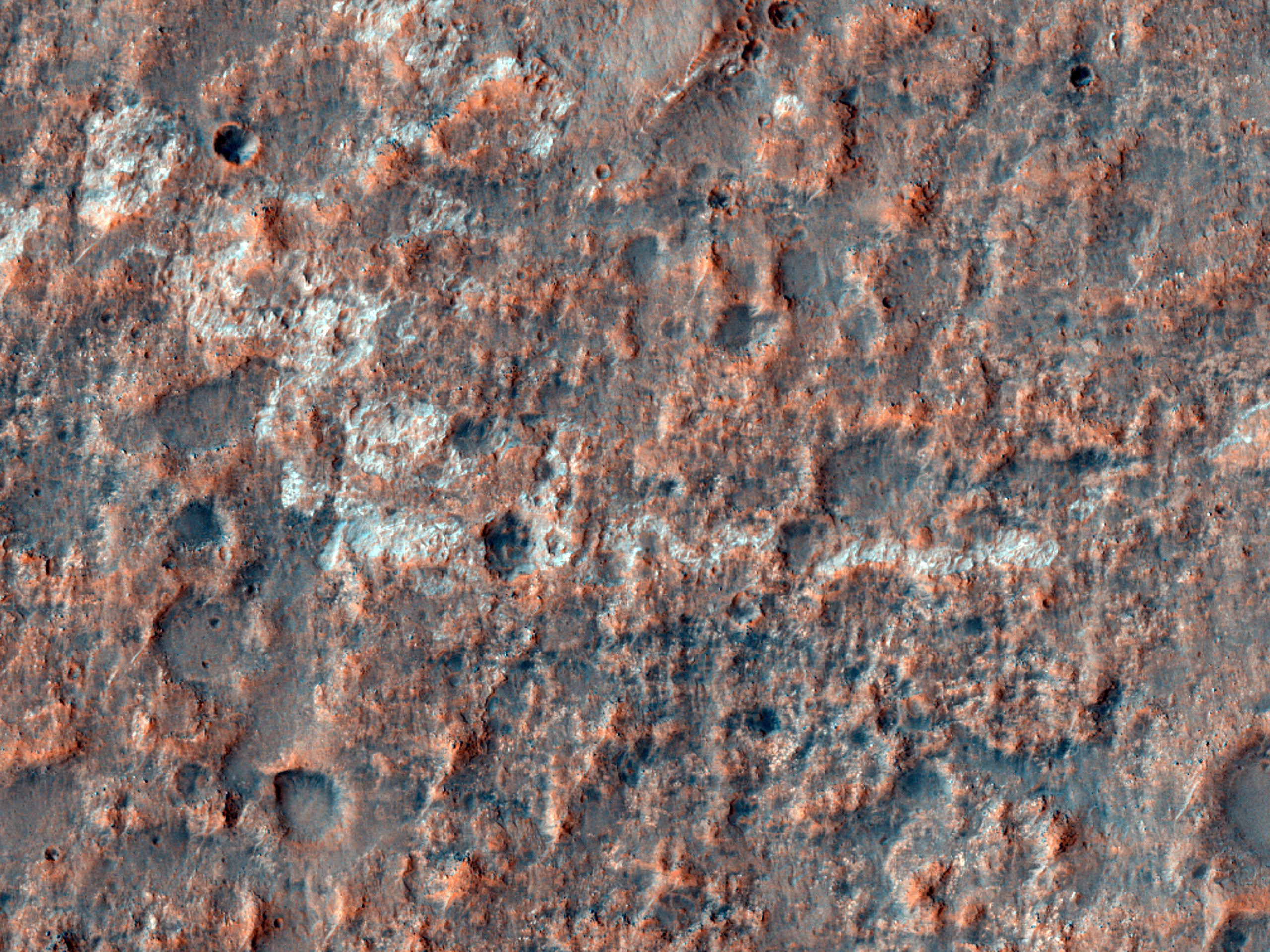 Light-Toned Landforms near the Edge of Hesperia Planum
