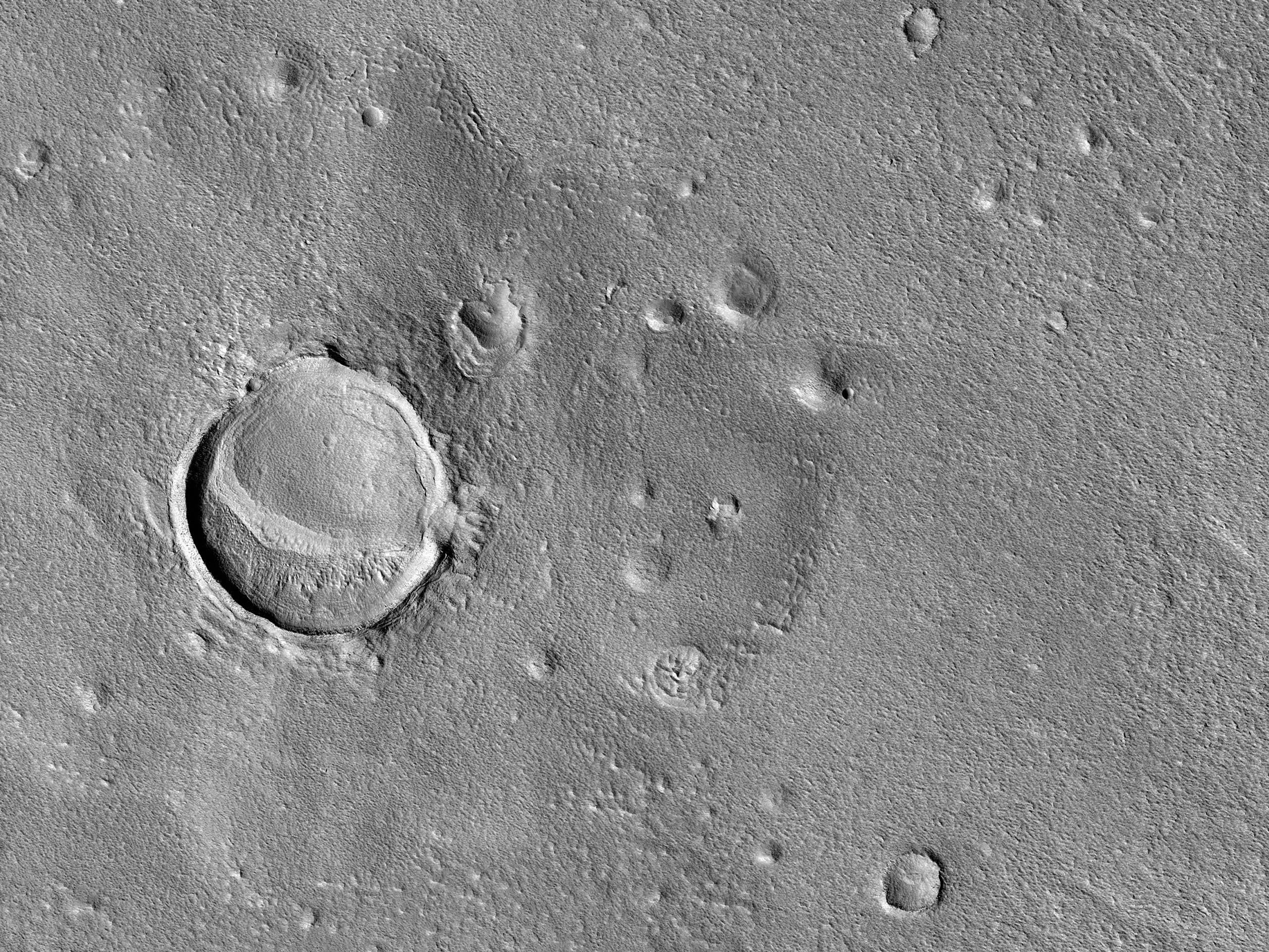 Layered Features of Two Craters