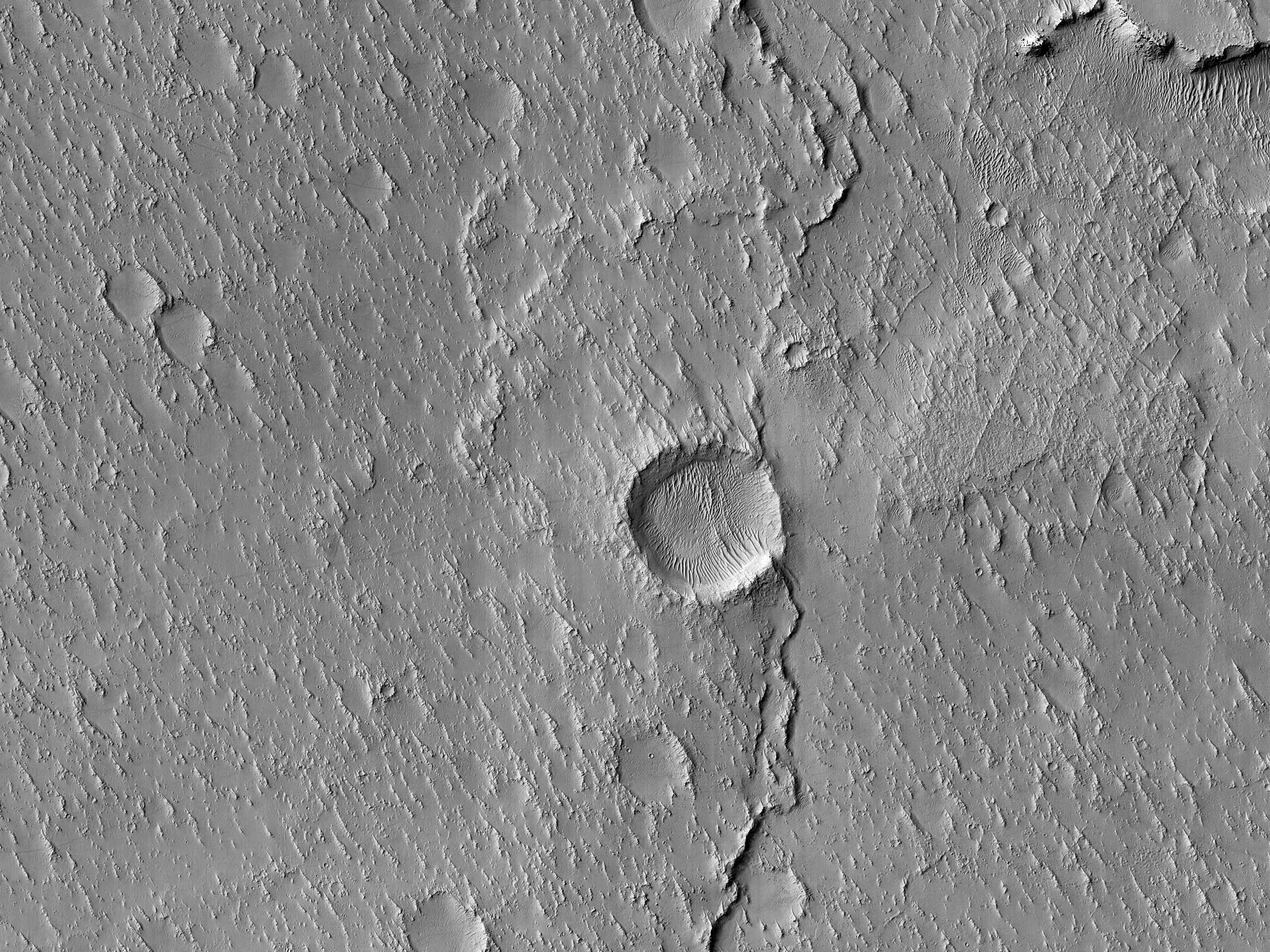 A Mare-Type Ridge Intersected by a Crater 