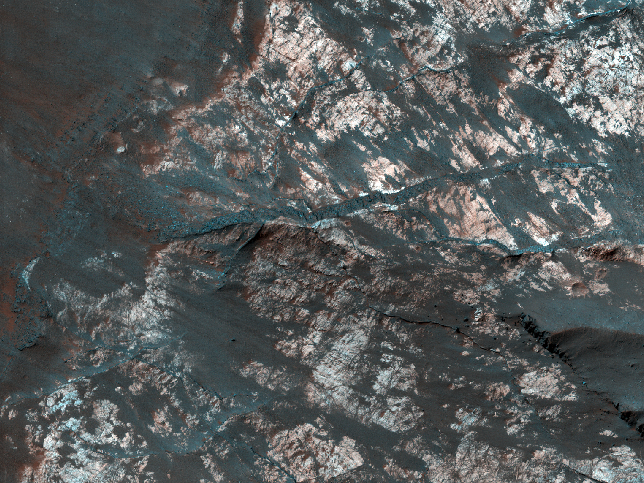Light-Toned Fractured Material at West End of Nectaris Montes Ridge