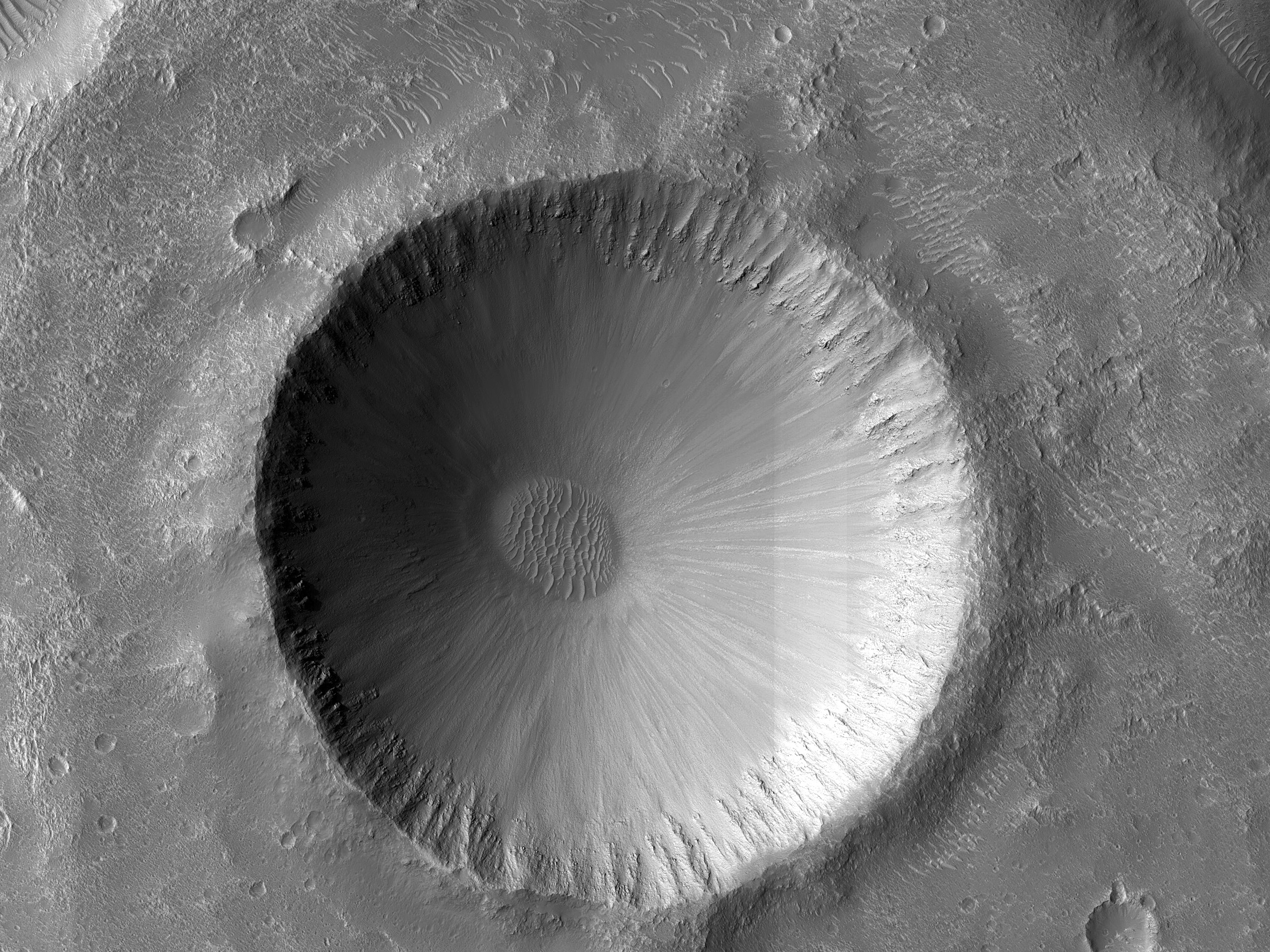 A Deflated Rampart Crater in Hephaestus Fossae