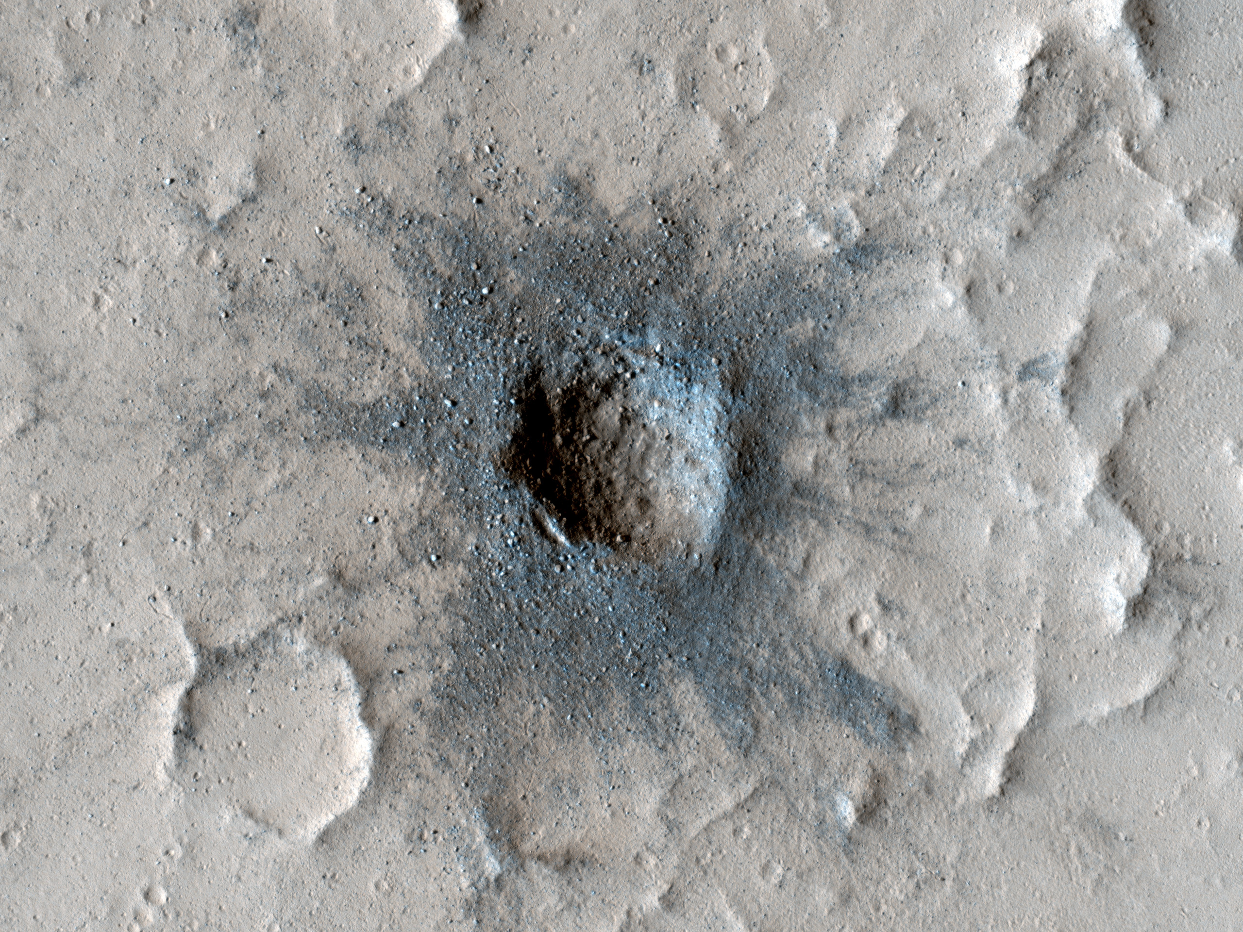 Slow Changes at an Old Impact Crater