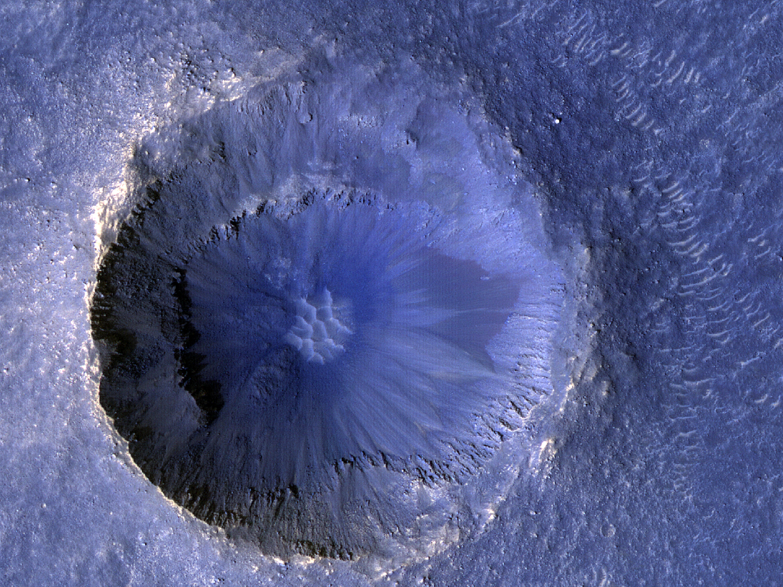 A Small, Very Recent Impact Crater