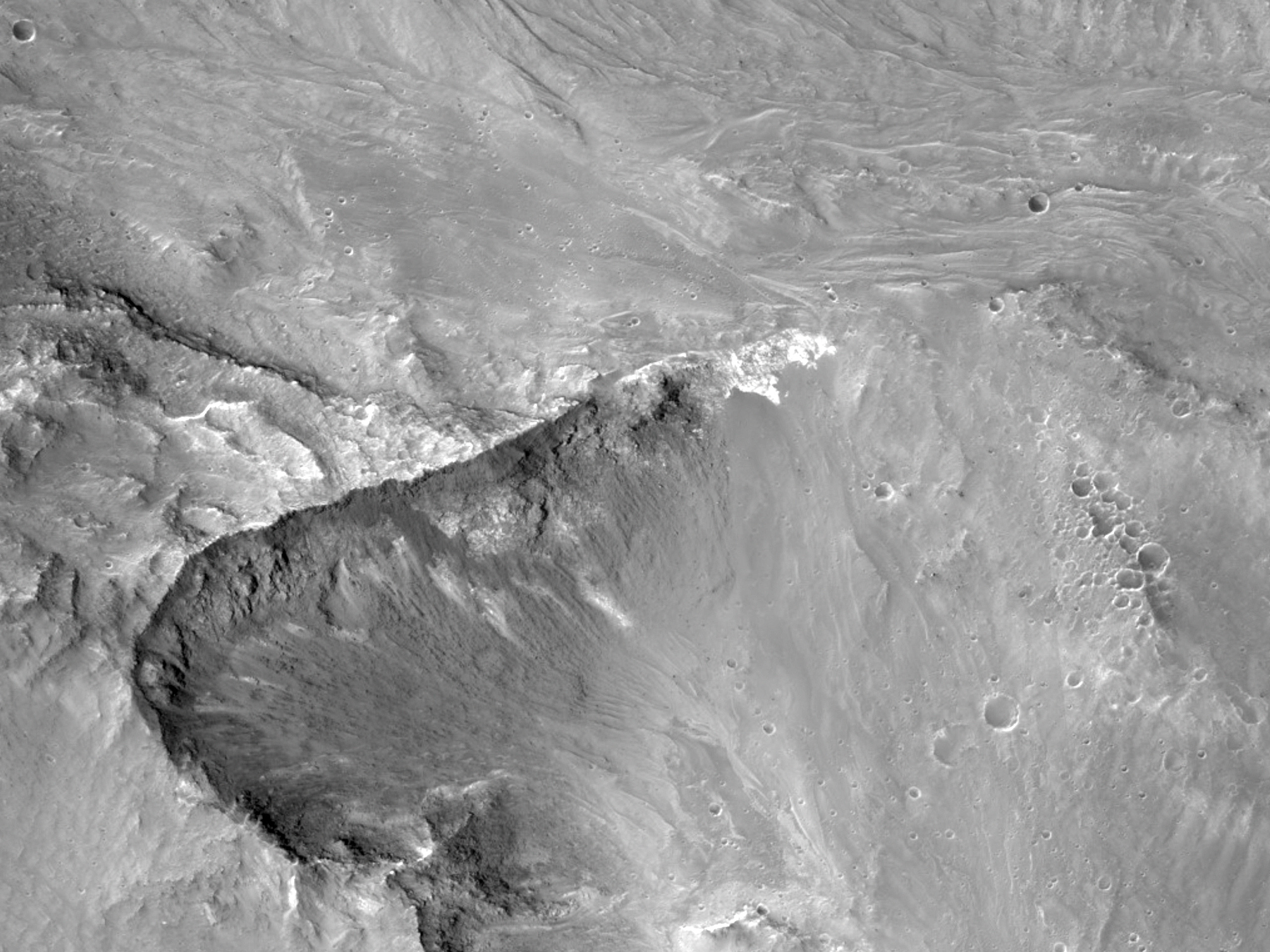 סלע חשוף בגוון-בהיר ב-Coprates Chasma