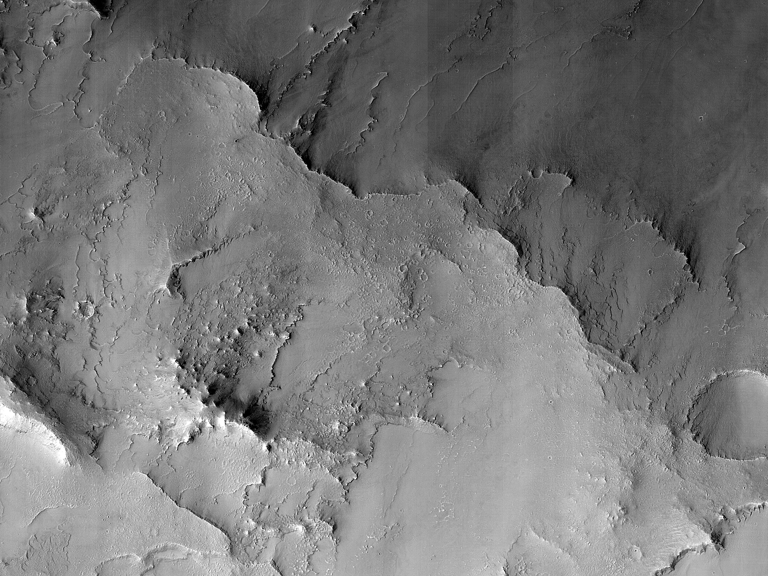 Gullies and Dark Material in a Crater