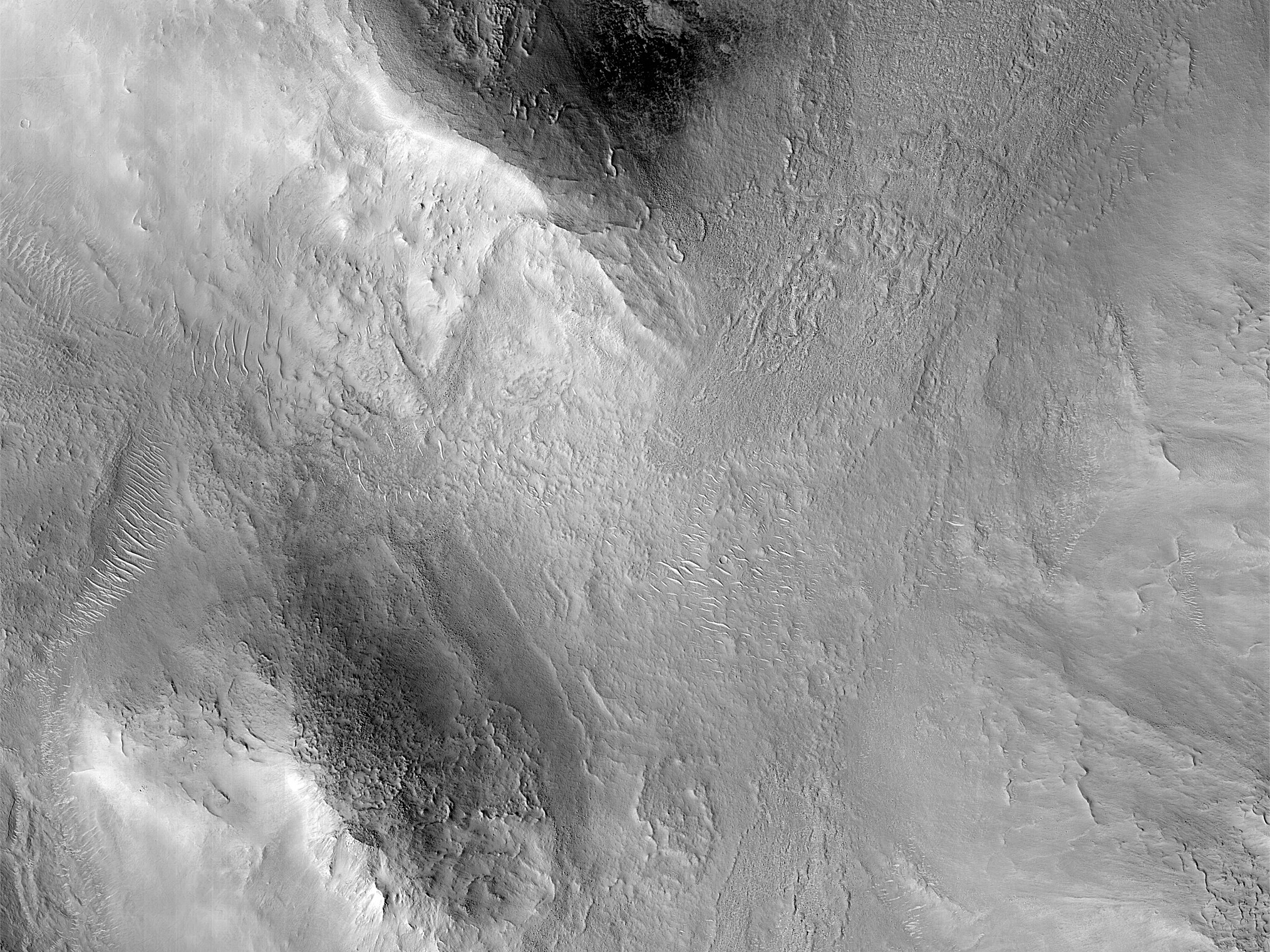 Mesas and Troughs in Nilosyrtis Mensae