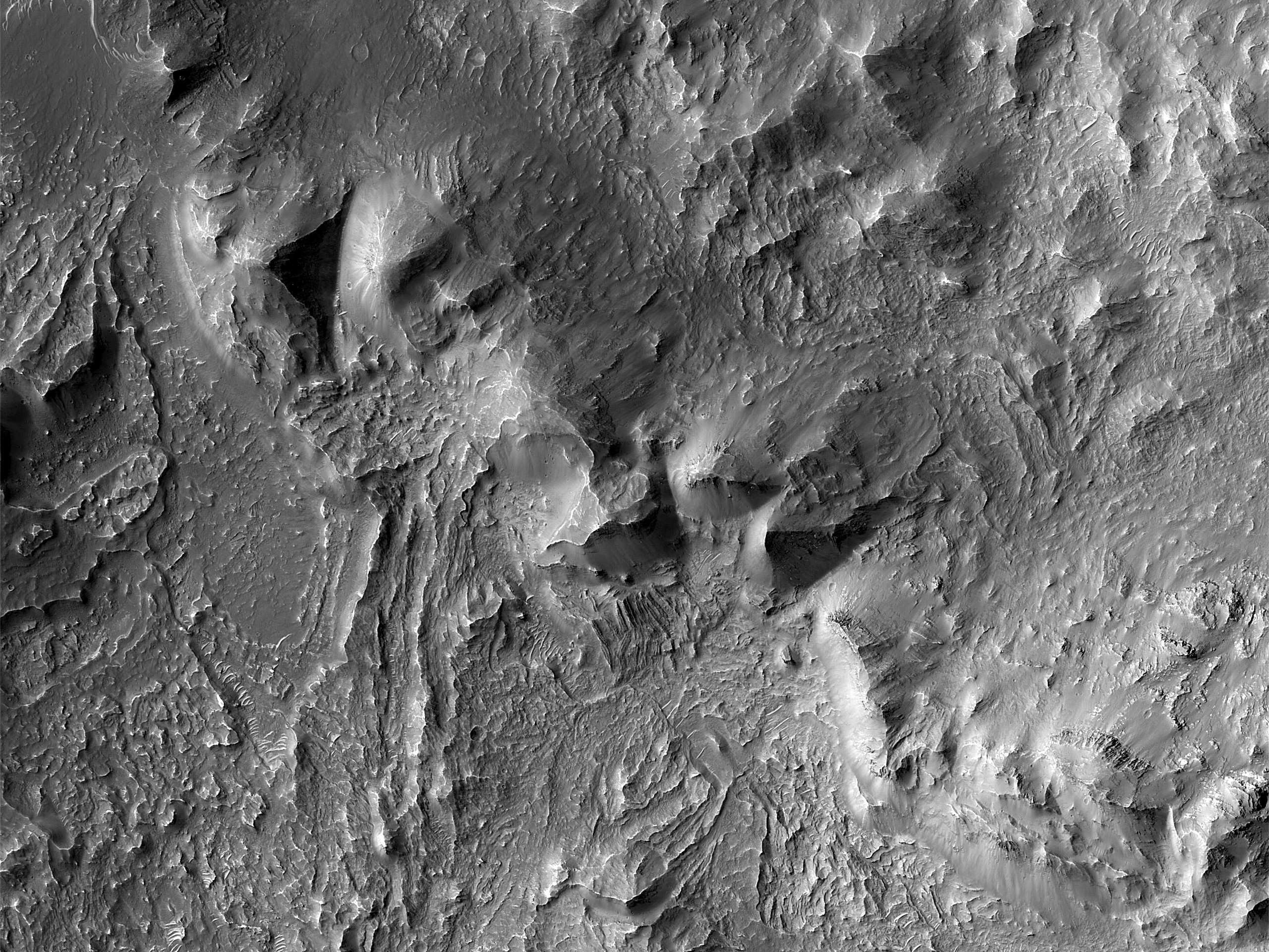 Crater in Crater Exposing Bedrock