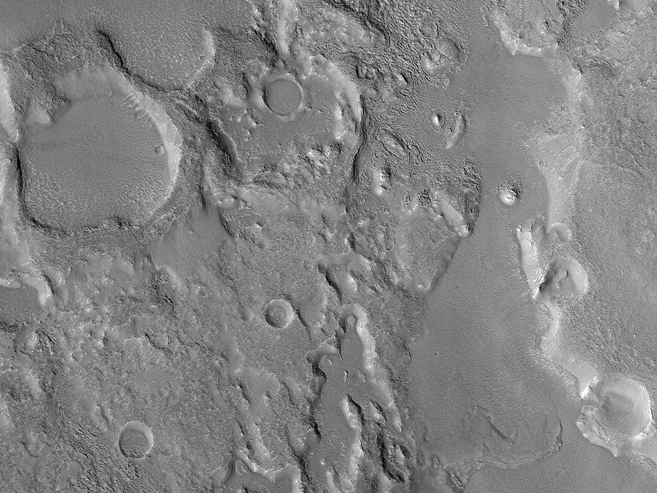 Dipping Layers in Craters in Ismeniae Fossae
