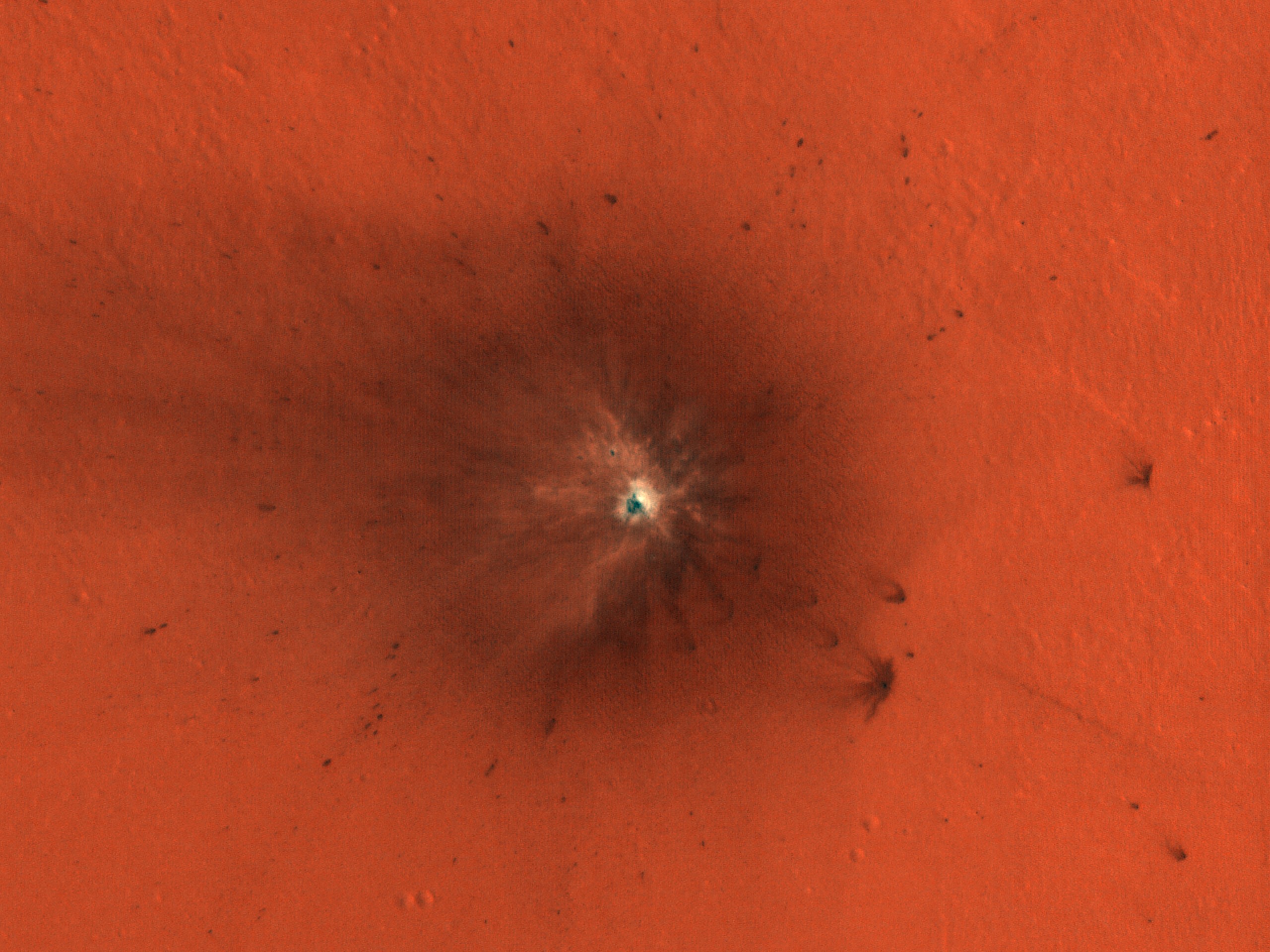 A New Impact Crater Exposes Bright Material