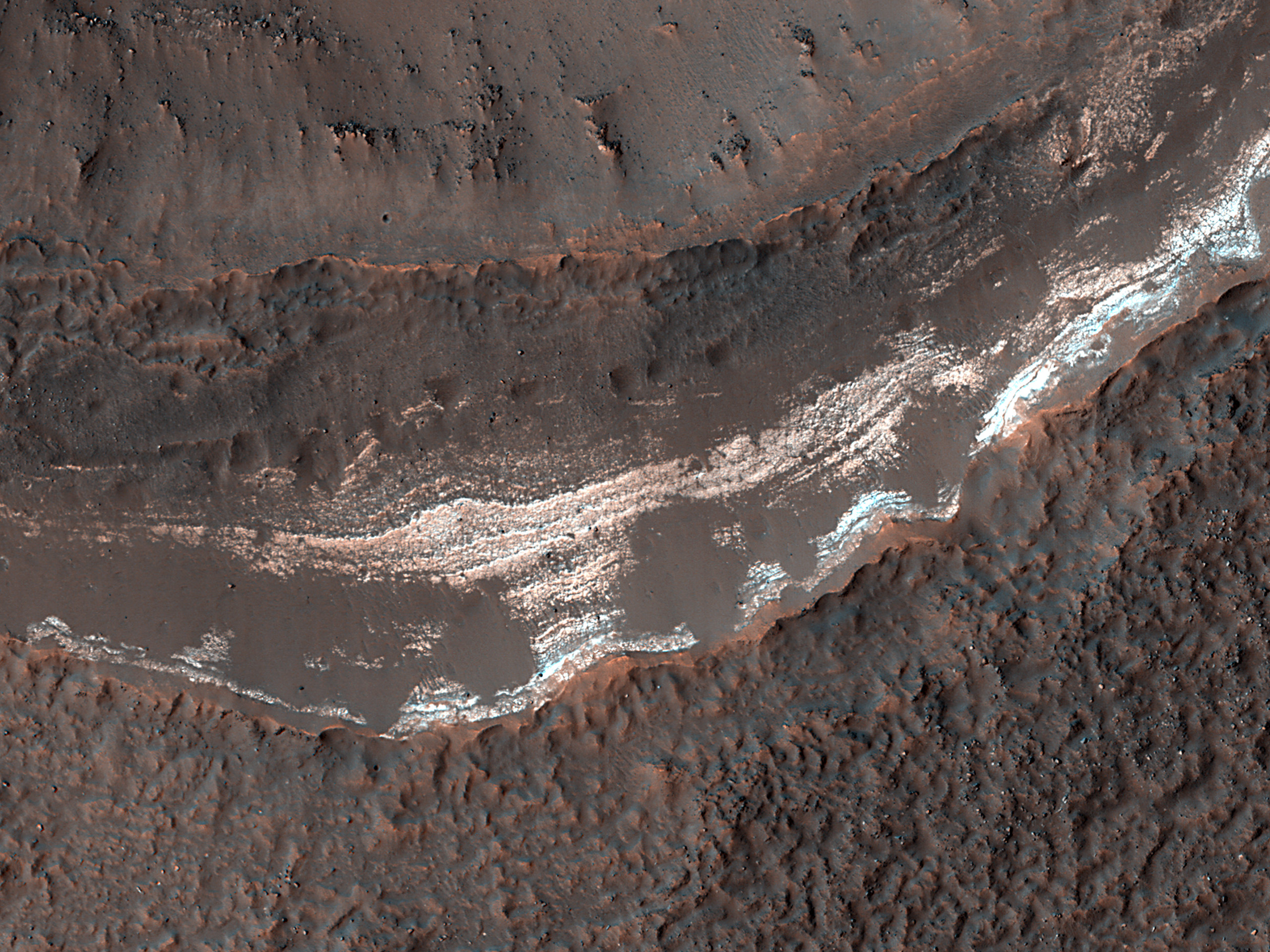 Ancient Layers Exposed by a Crater within a Crater