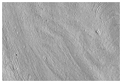 Fretted Terrain Valleys and Apron Materials