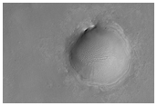 Light-Toned Layered Outcrops South of Ius Chasma, in MOC Image S06-01260