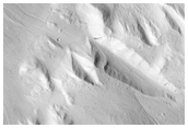 Elliptical Depression on Lower Northwest Flank of Hecates Tholus