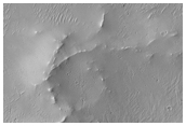 Fresh Impact Crater with Bright, Rocky Ejecta