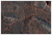 Layered Terrain Near Putative Phyllosilicates in Mawrth Valles 