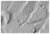 Troughs and Blocks on the Northern Edge of Lucus Planum