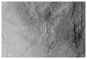Eroded Layers and Scallops and Polygons